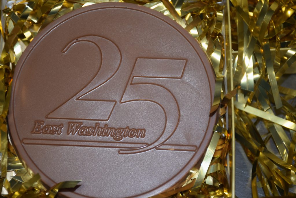 25 E Washington chocolate coin