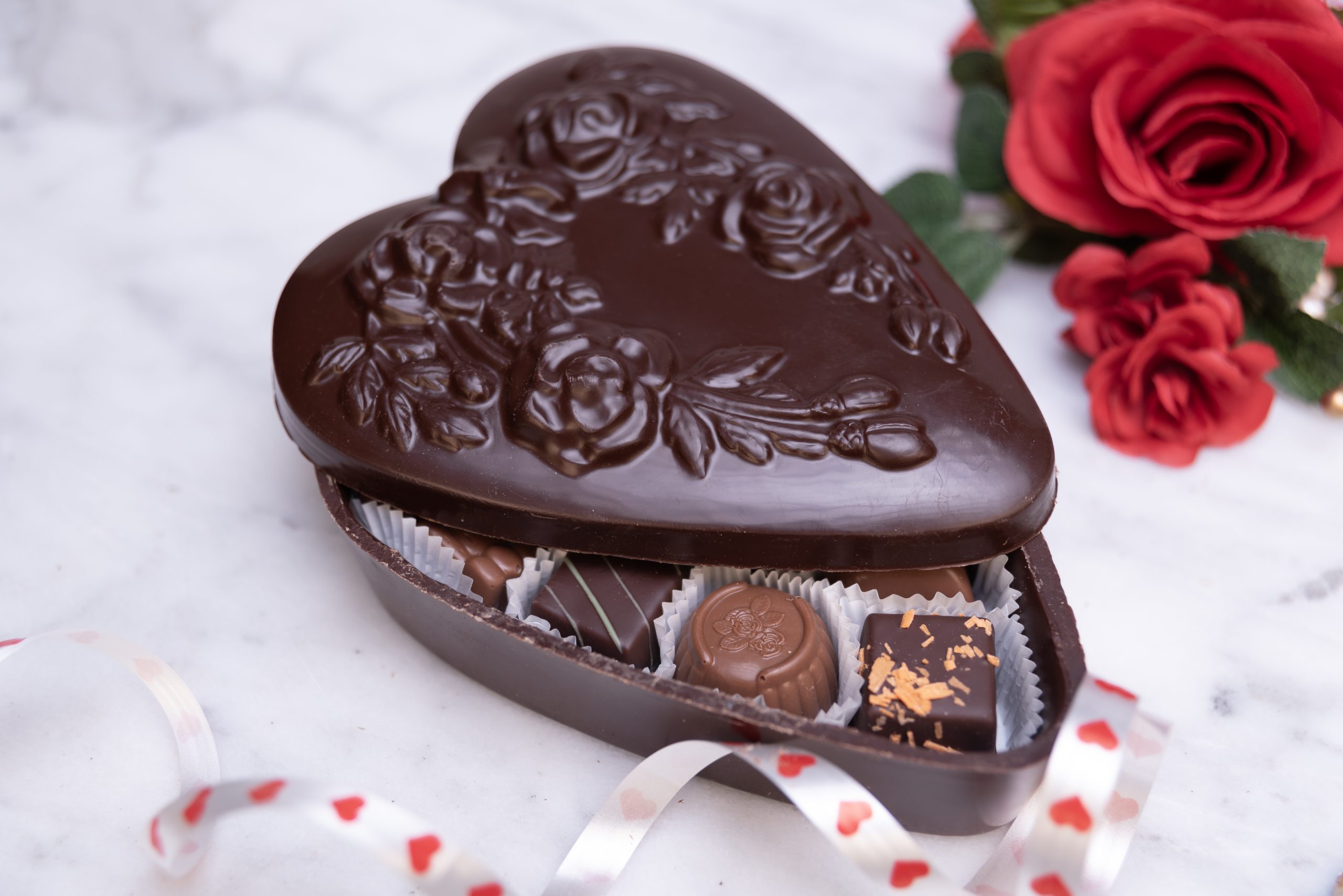 Heart shaped chocolate box filled with 11 pieces of chocolate
